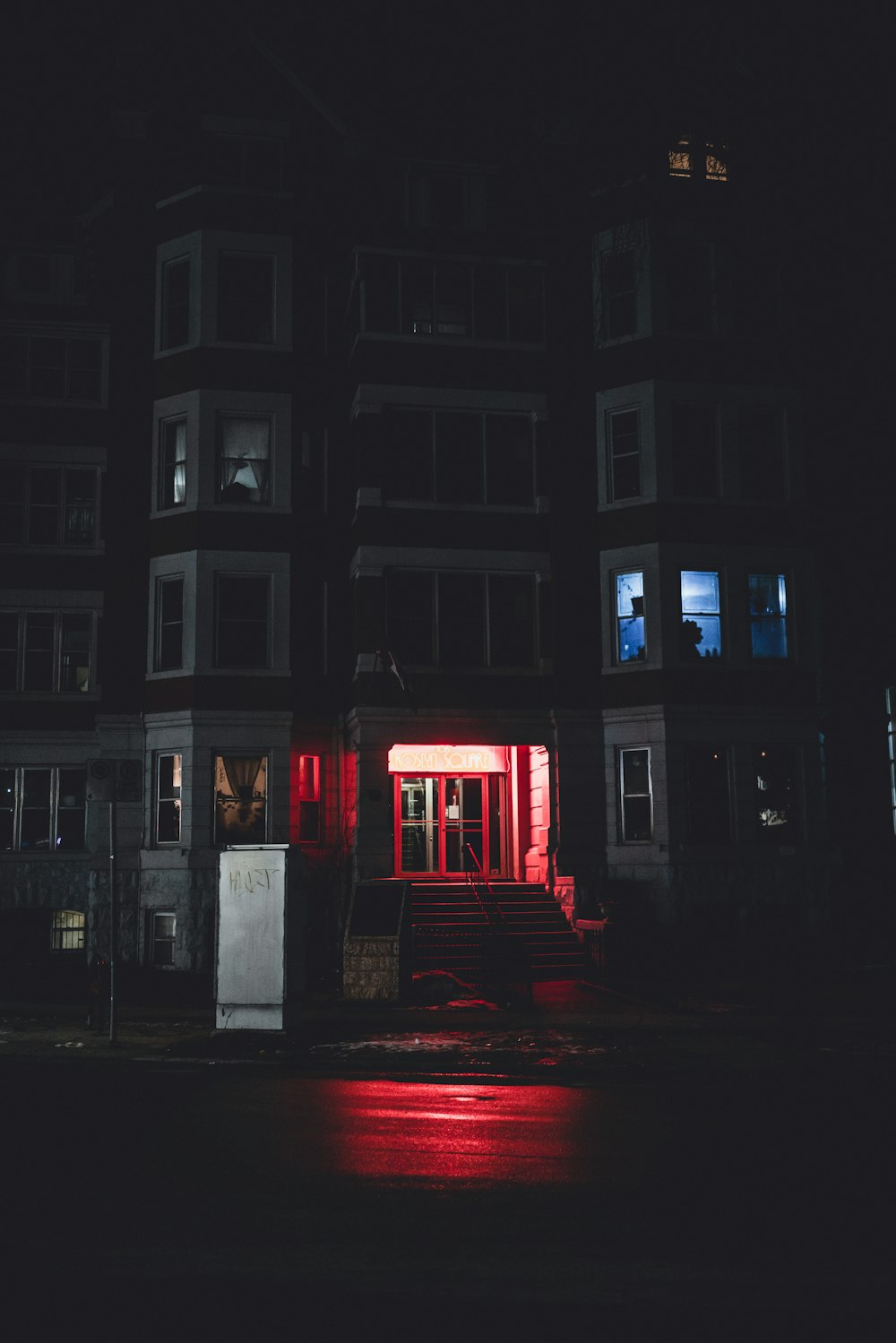 red and black building during night time
