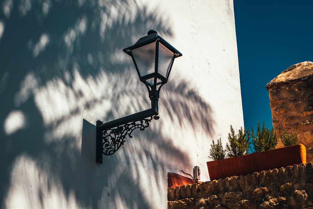 black street light under blue sky during daytime