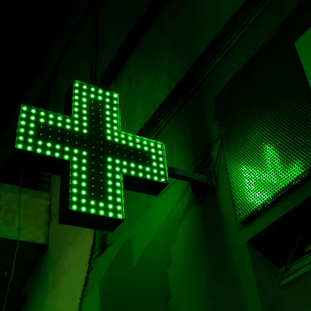 green and white x sign