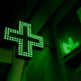 green and white x sign