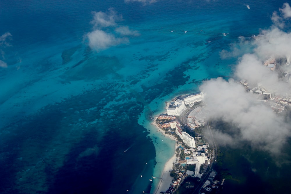 aerial view of city near ocean during daytime