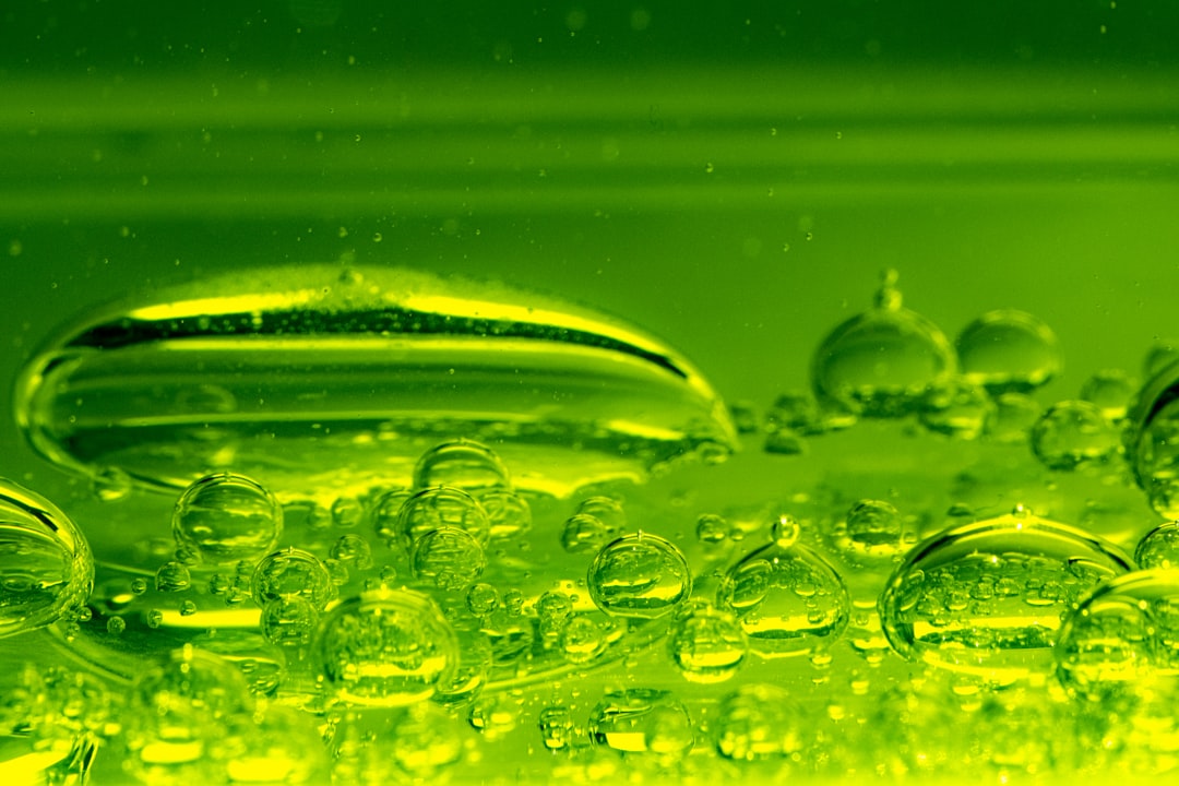 water droplets on glass with purple background