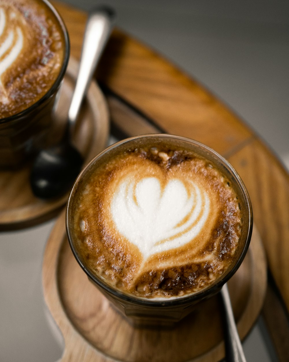 brown and white ceramic mug with coffee