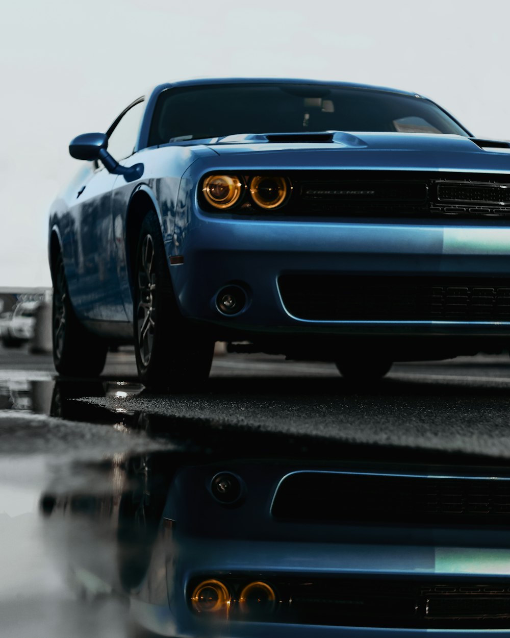 blue and black chevrolet camaro