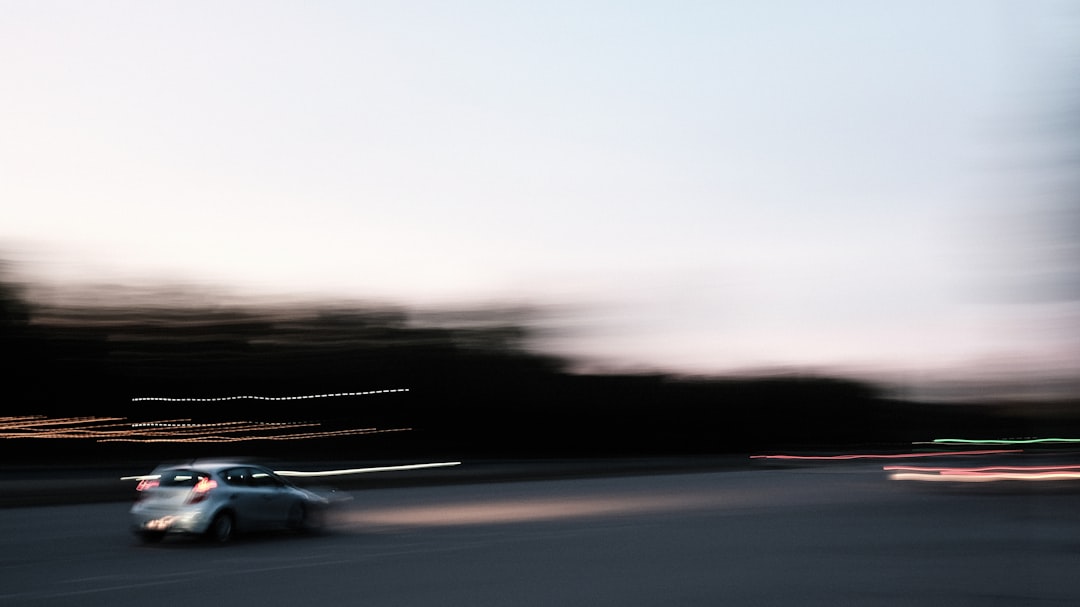 black car on road during daytime