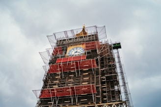 red and black tower under white sky during daytime