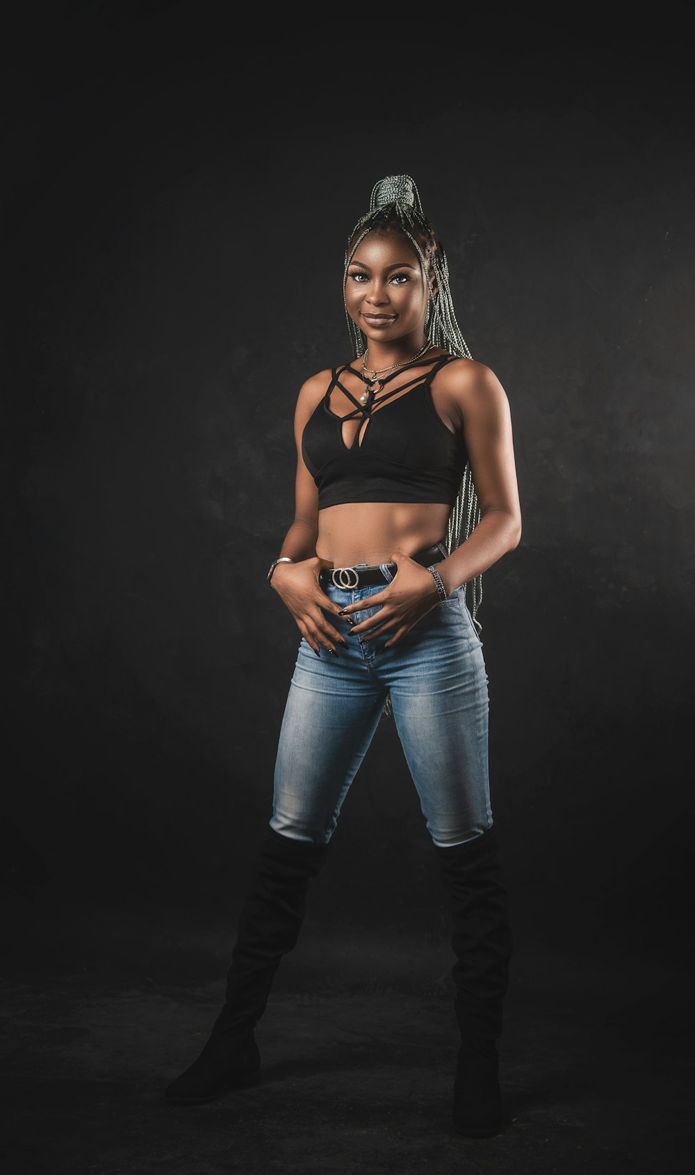 Woman in black sports bra and blue denim jeans photo – Free African model  Image on Unsplash
