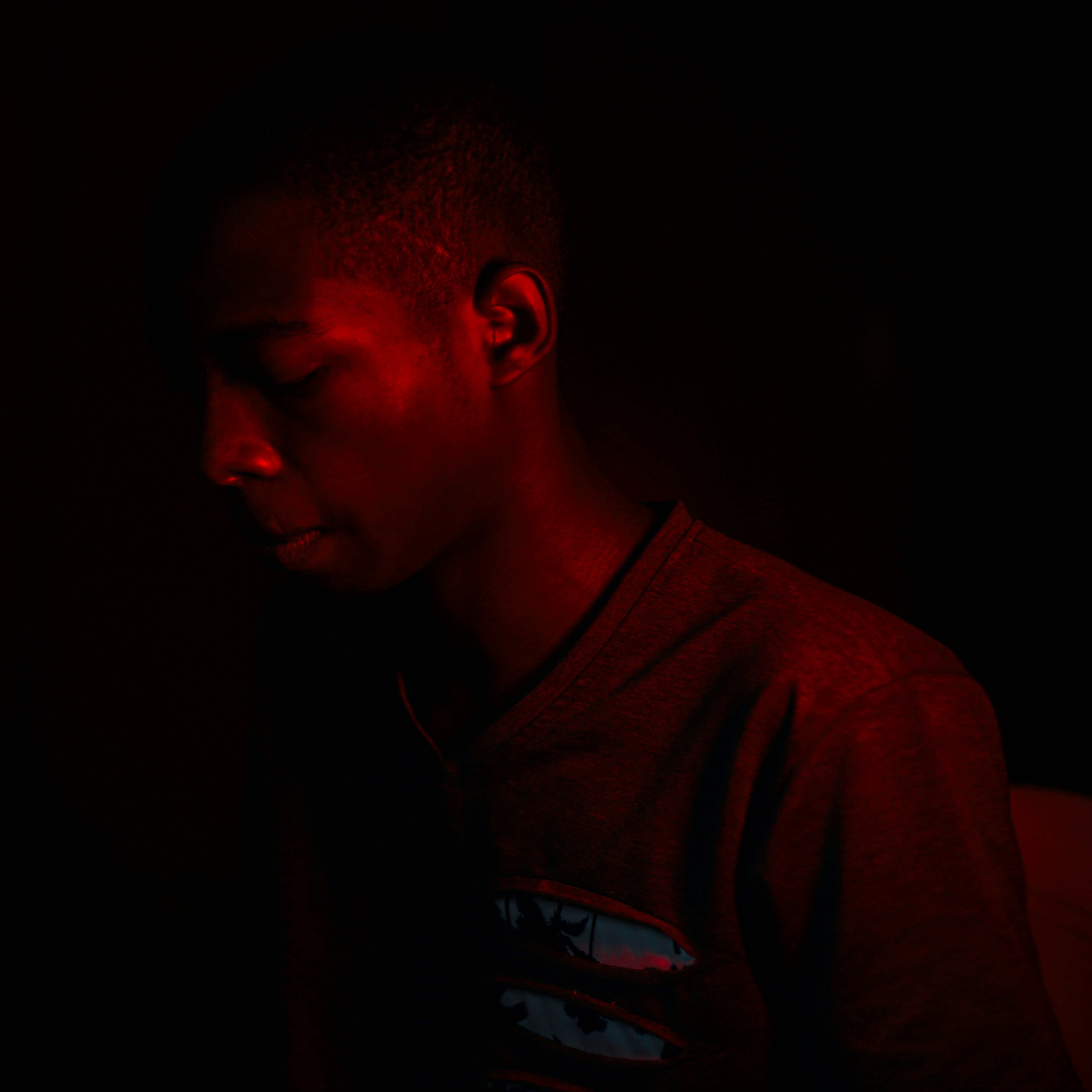 Portrait of a young male poet, thoughtful expression, soft natural lighting