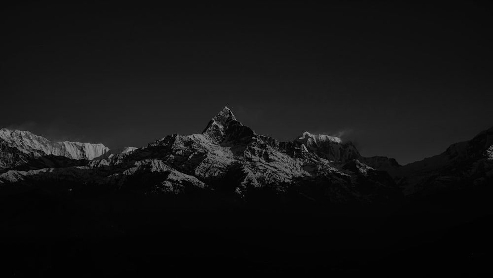 grayscale photo of rocky mountain