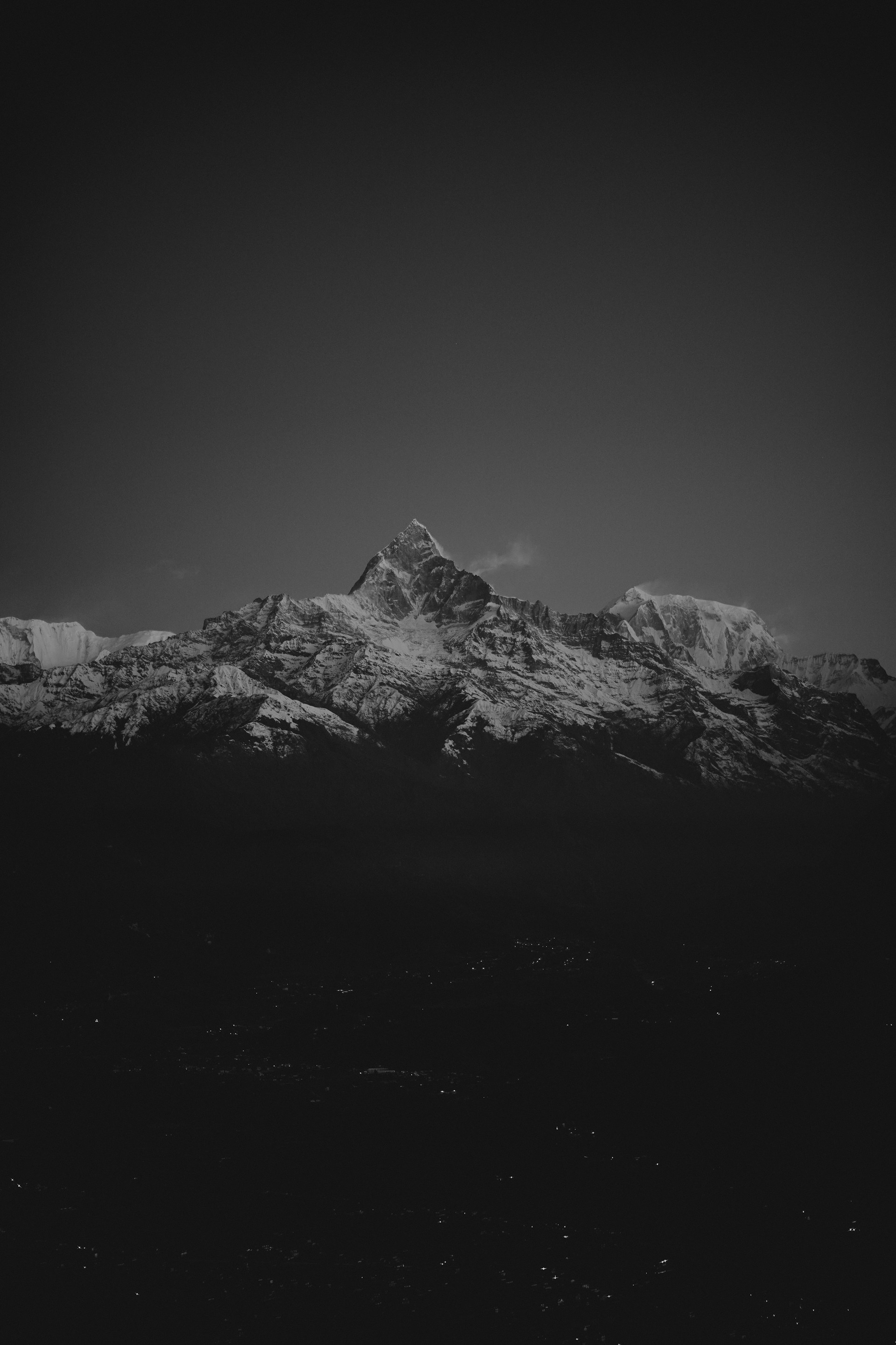 grayscale photo of snow covered mountain