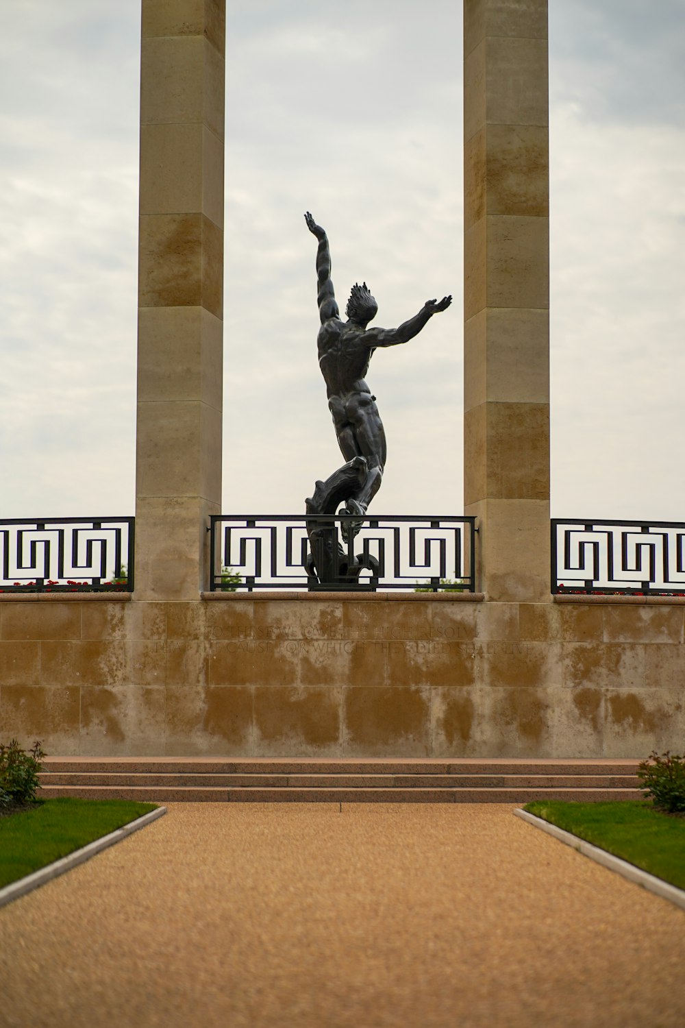 man in black jacket statue