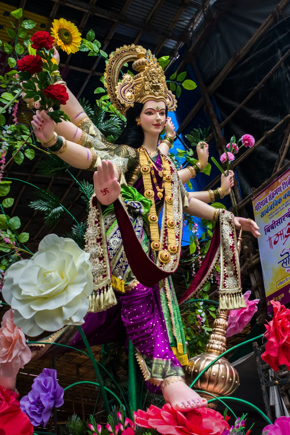 woman in purple and gold sari dress