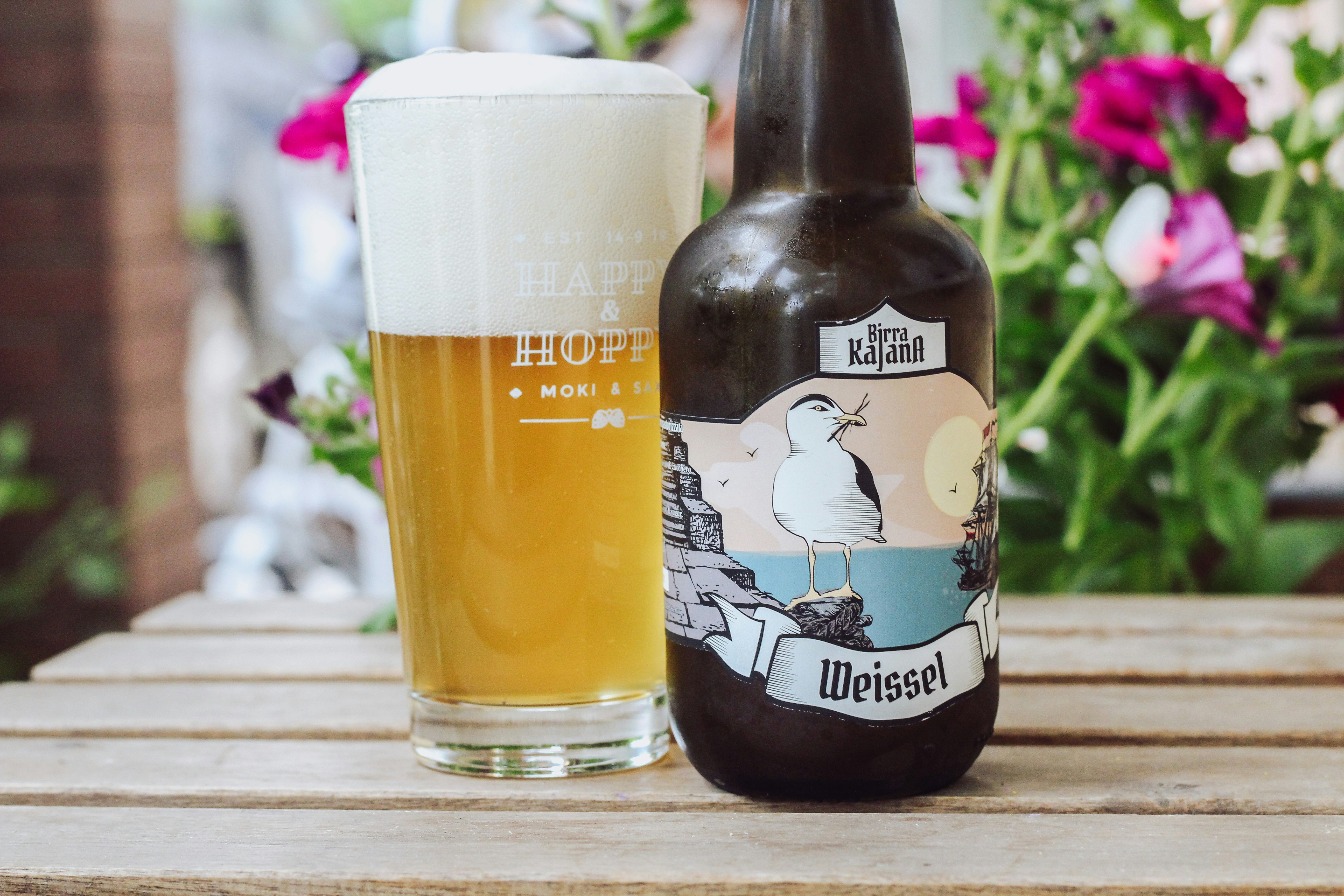 clear glass bottle with brown liquid