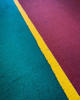green and yellow concrete road