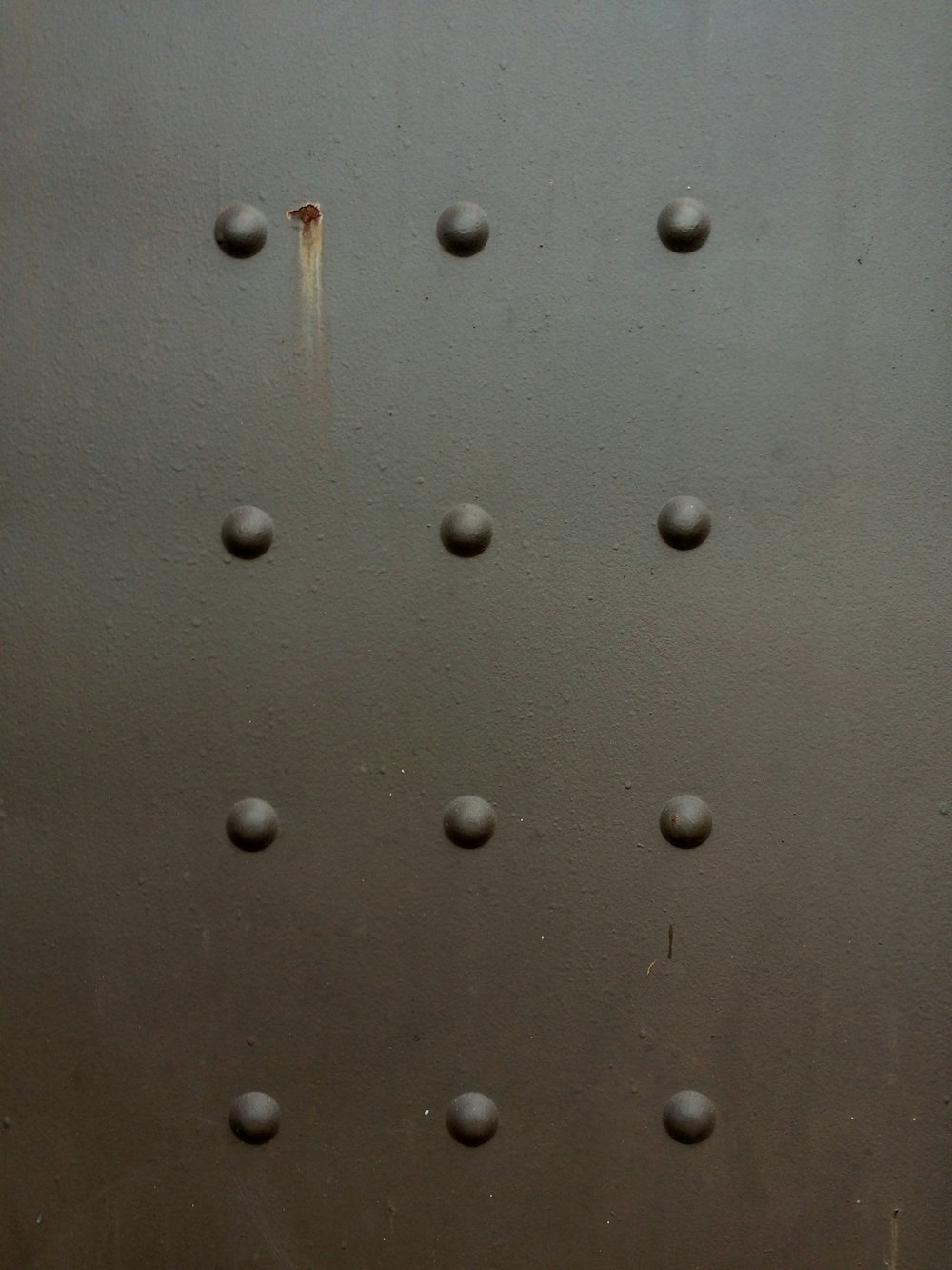 silver round coins on gray surface