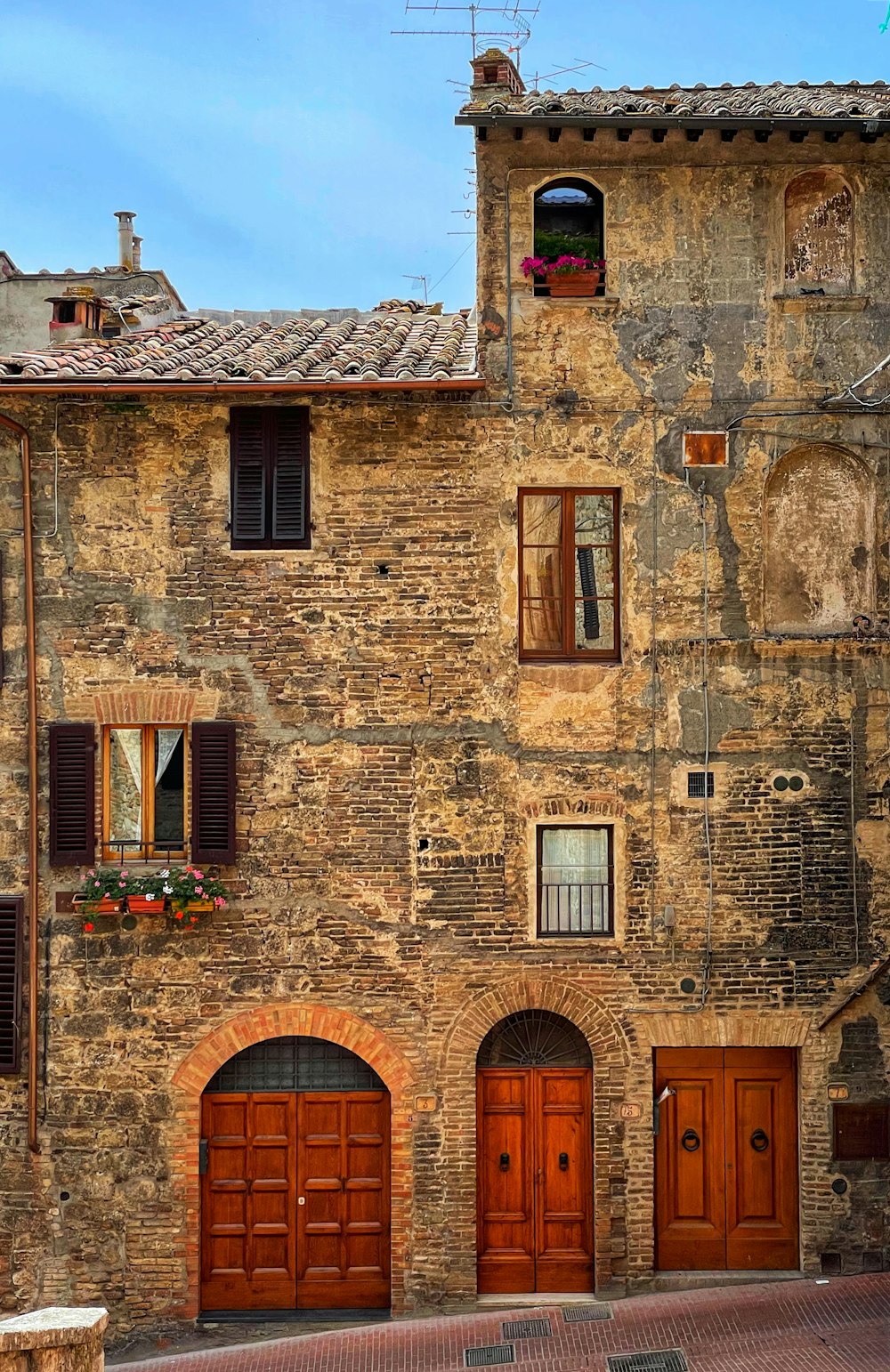 brown brick building during daytime