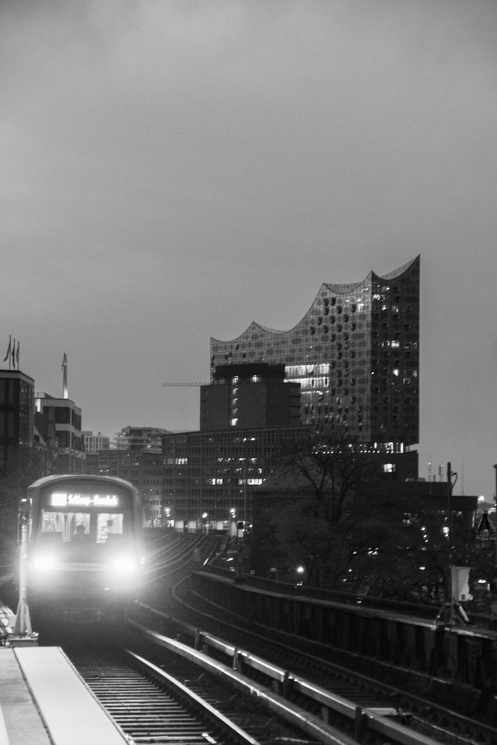 grayscale photo of city buildings