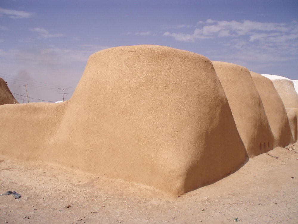 brown rock formation under blue sky during daytime