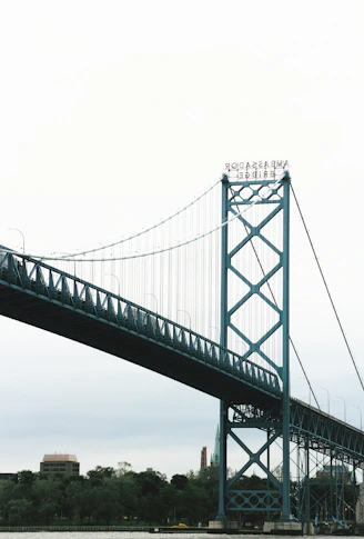 black bridge under white sky during daytime