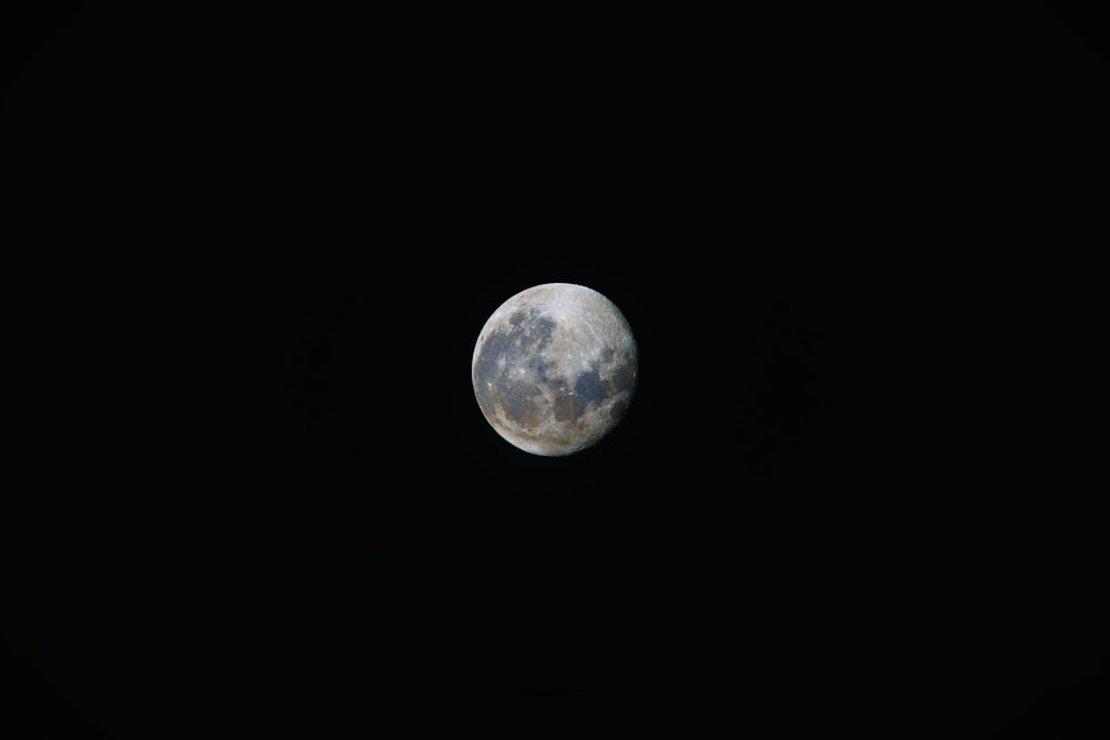 full moon in dark night sky