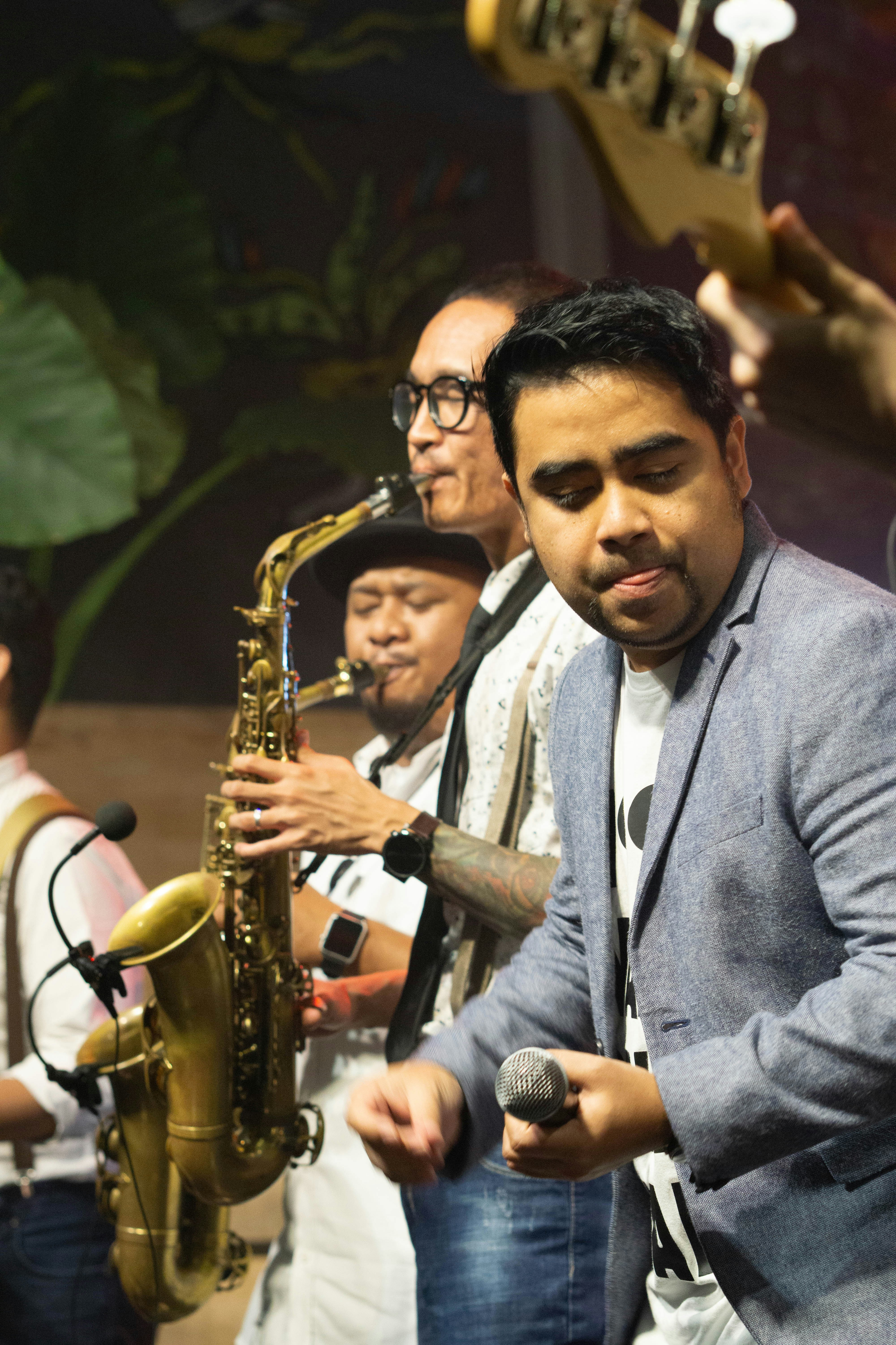 A saxophone player performing a solo.