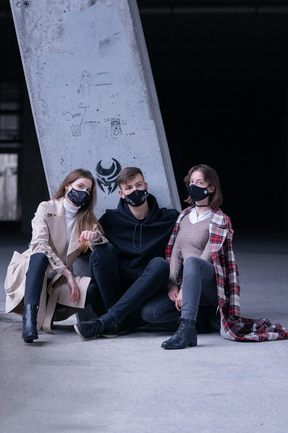 2 women sitting on floor