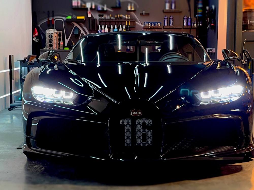 black porsche 911 parked on street during night time