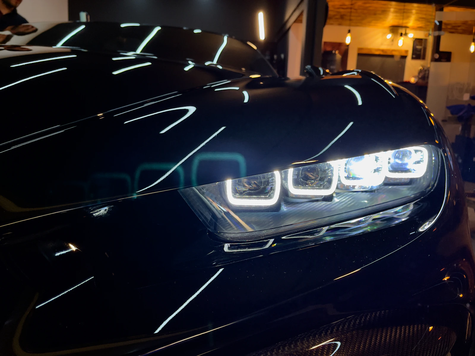 Light drawing clean lines across a corrected hood