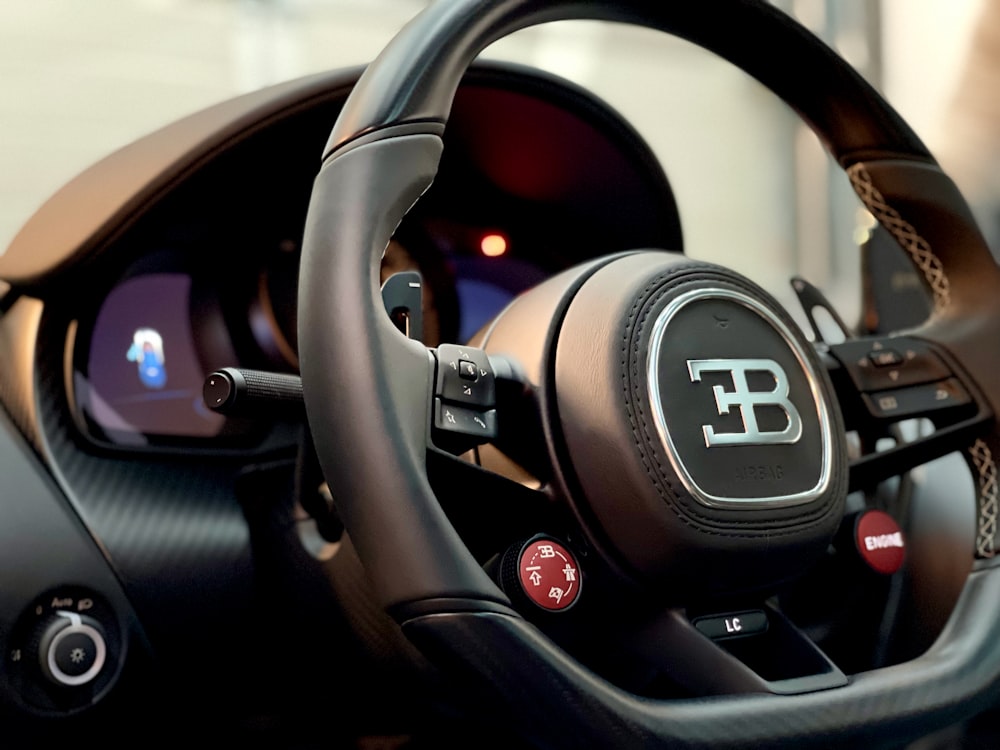 black and gray car steering wheel