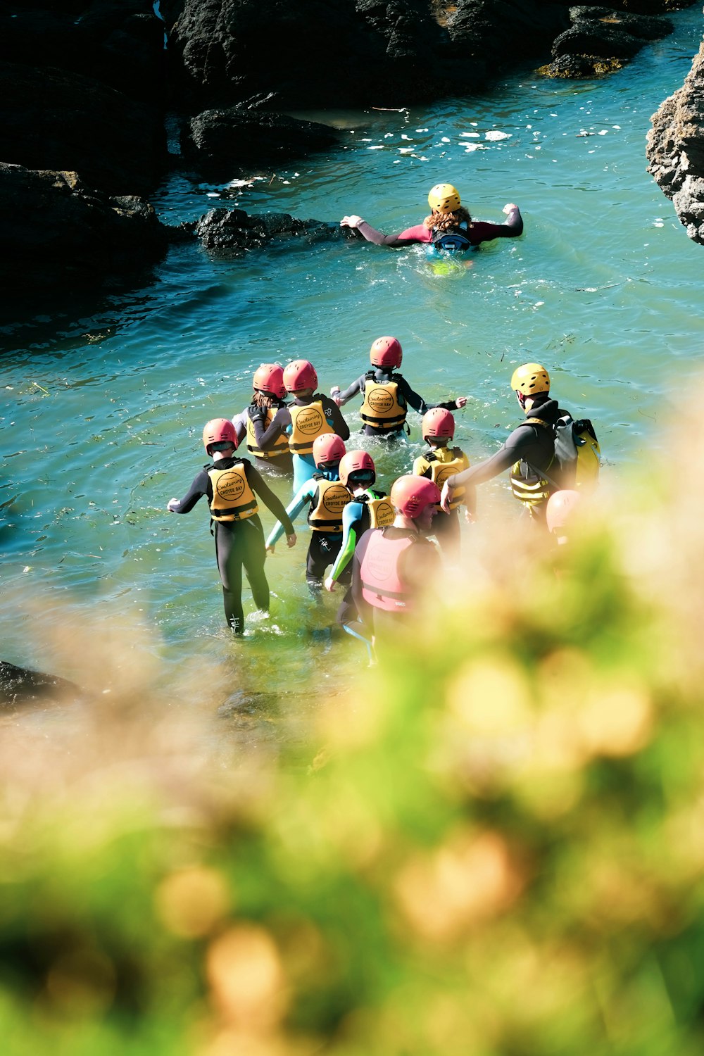 people in body of water during daytime