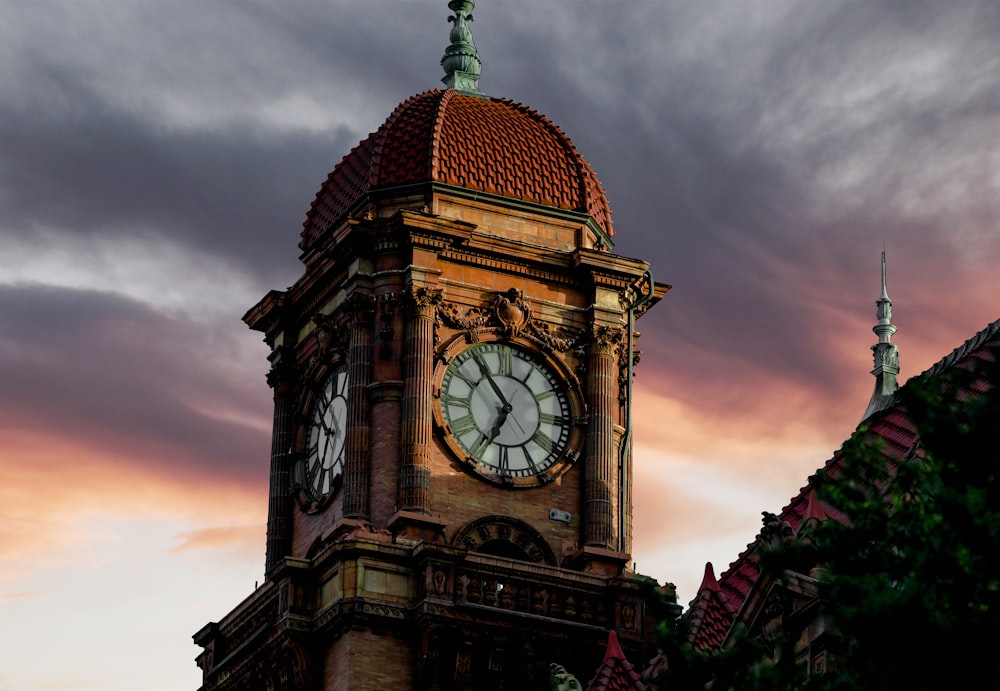brown and green clock tower
