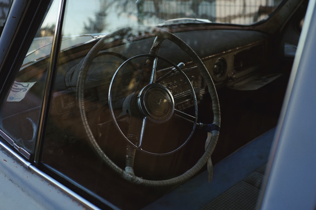 black car steering wheel during daytime, Vintage car interior