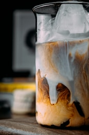 white and brown labeled bottle