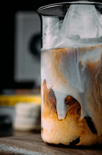 white and brown labeled bottle