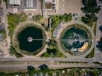 aerial view of green trees and brown buildings during daytime