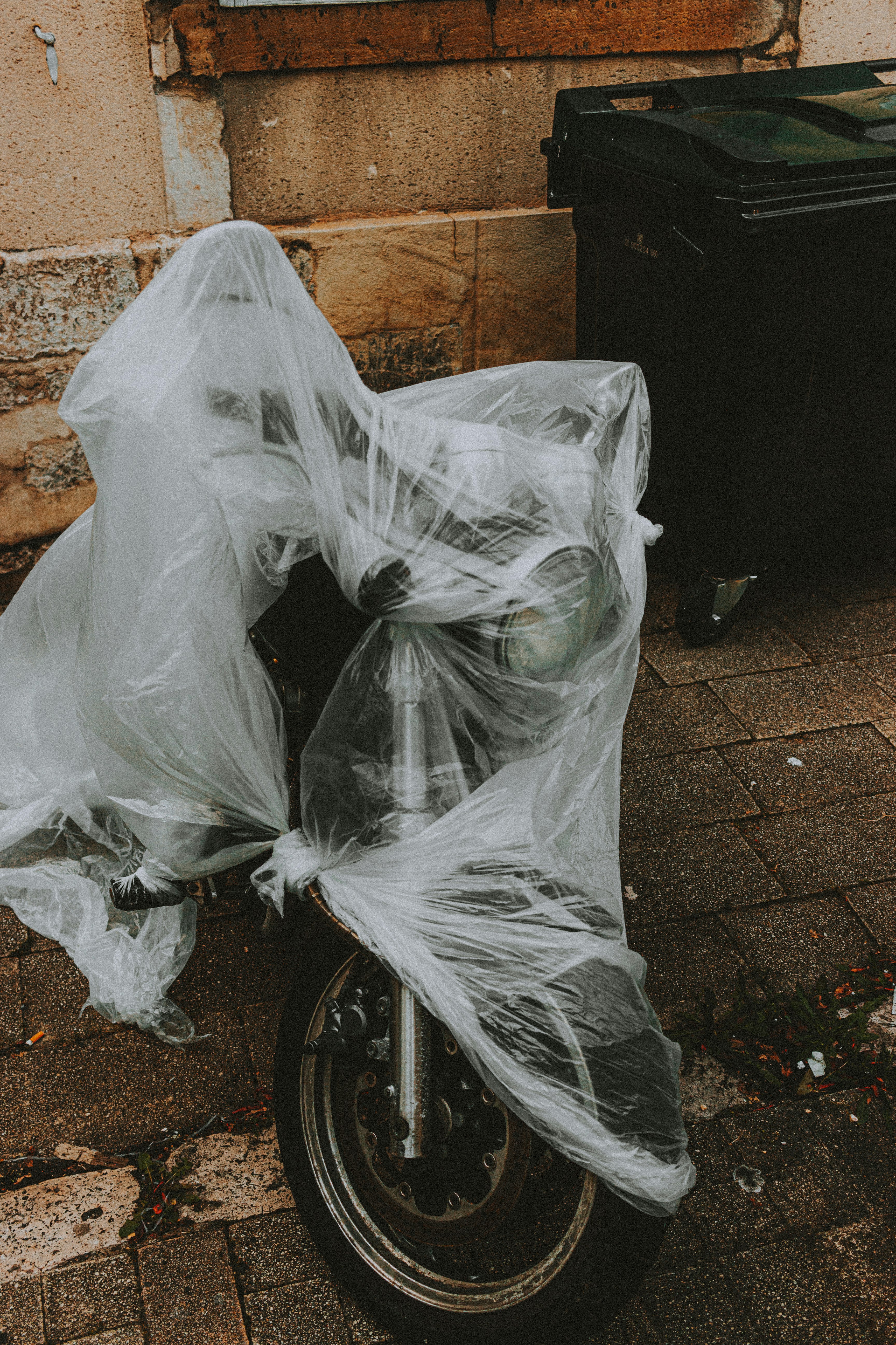 white plastic bag on bicycle wheel