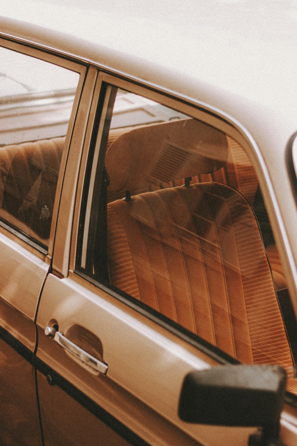 brown and white car door