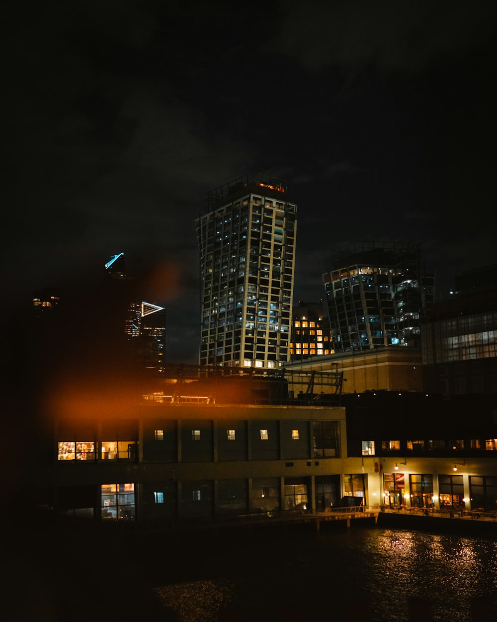 city skyline during night time