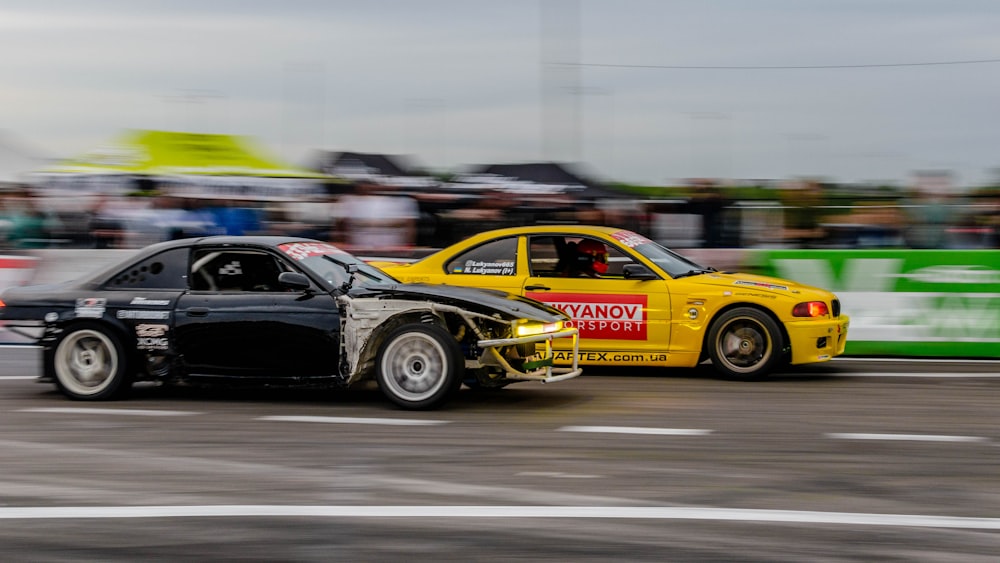 black and yellow porsche 911 on road during daytime