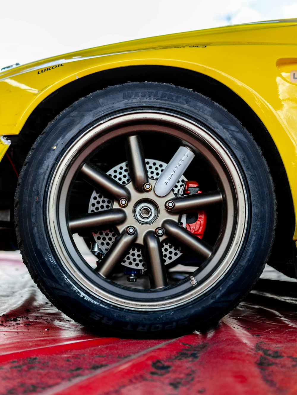 silver and black car wheel