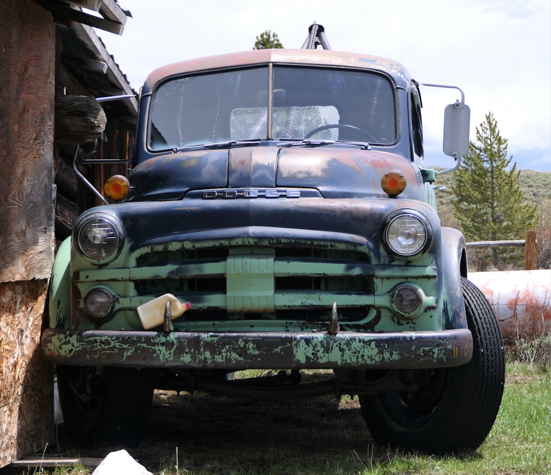 green and black vintage car,