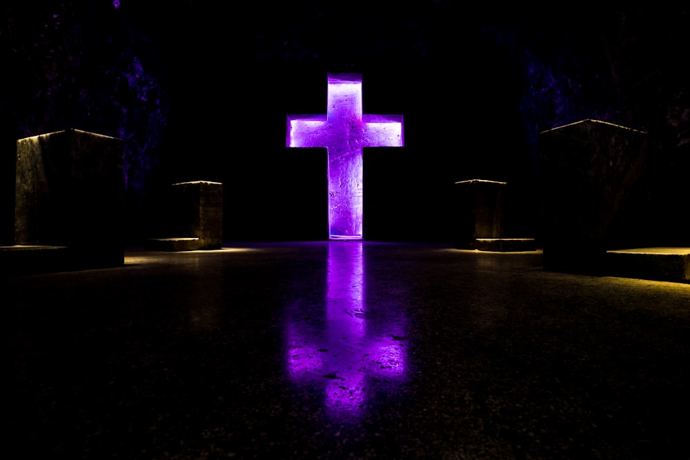 purple and pink cross with lights