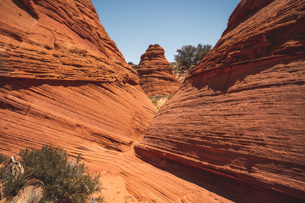 brown rock formation under blue sky during daytime