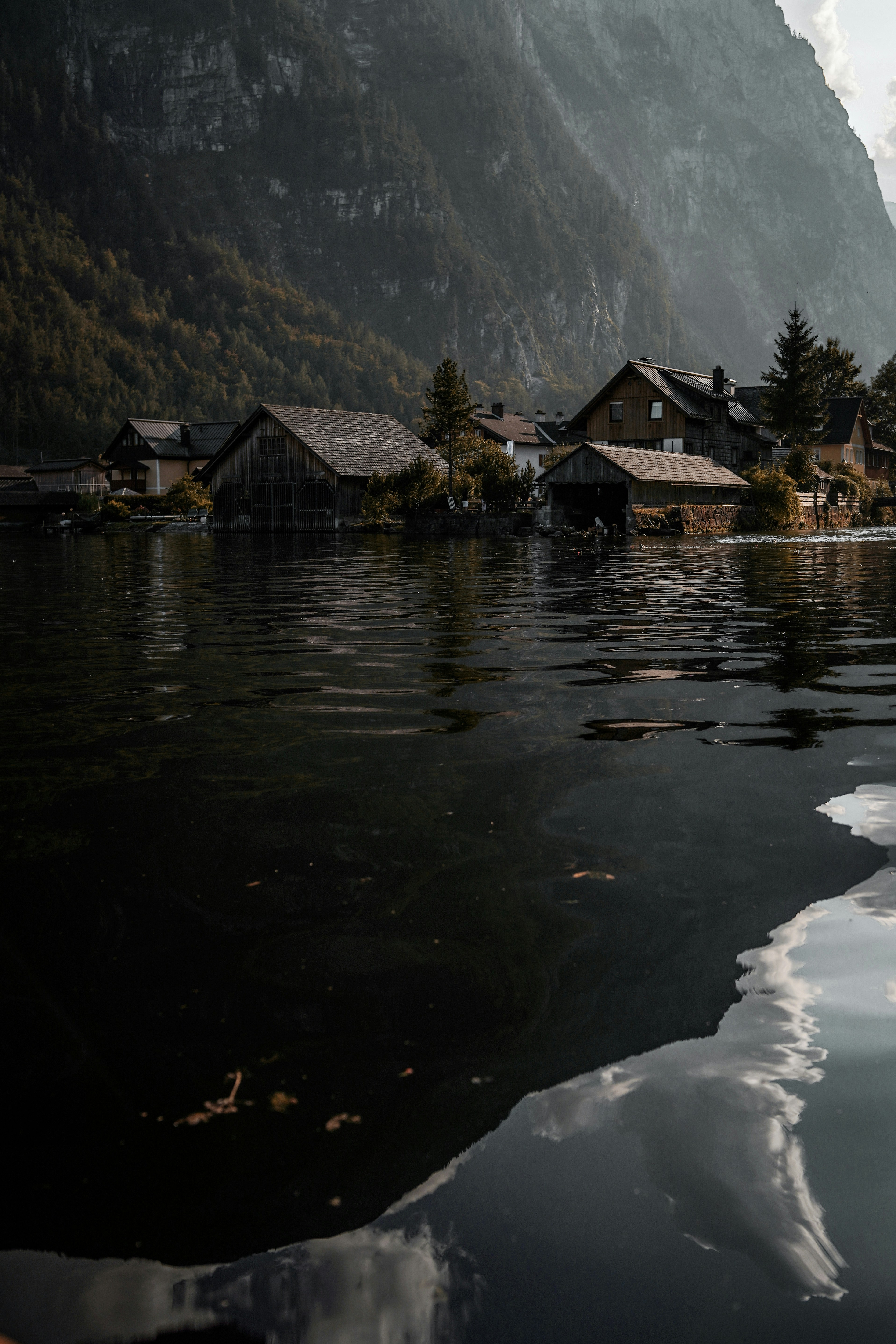 Brown and white house near lake and mountain photo – Free Hallstatt ...