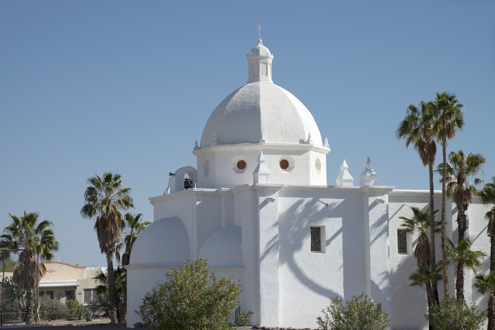 white concrete building under blue sky during daytime