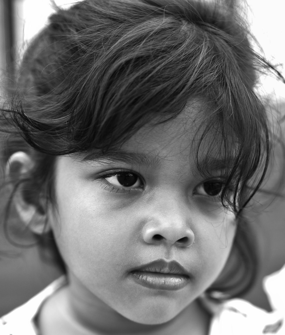 grayscale photo of girl in white shirt