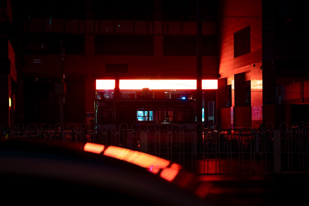 red and white concrete building during night time