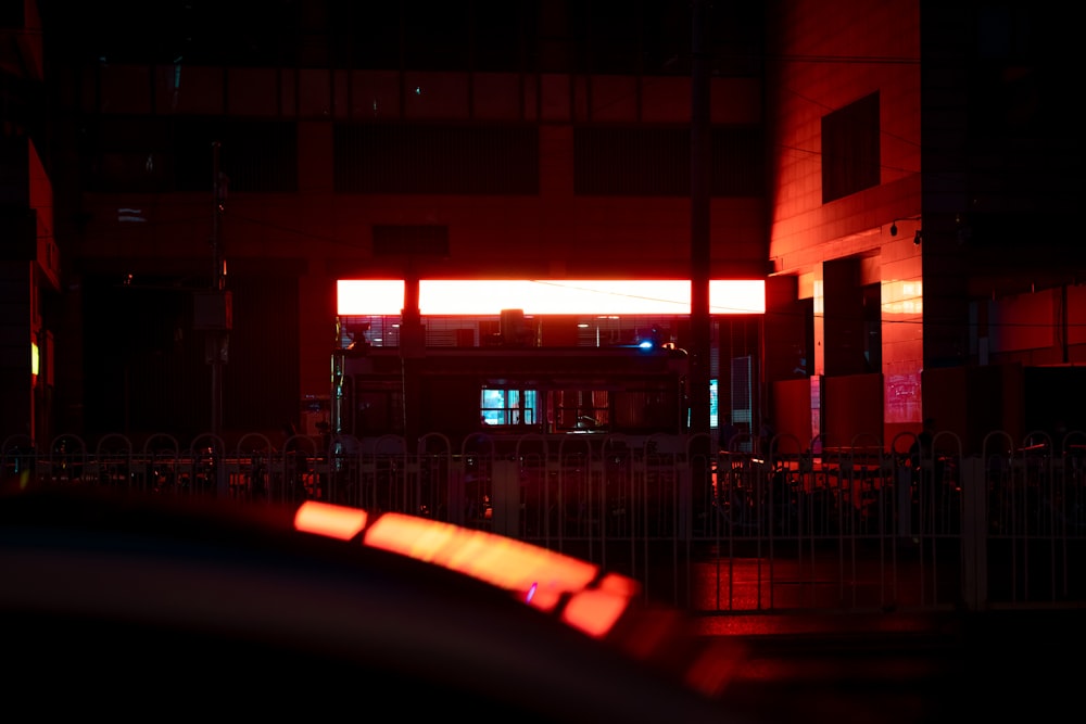 red and white concrete building during night time