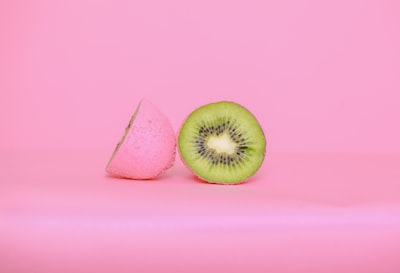 sliced apple fruit beside white paper surreal google meet background