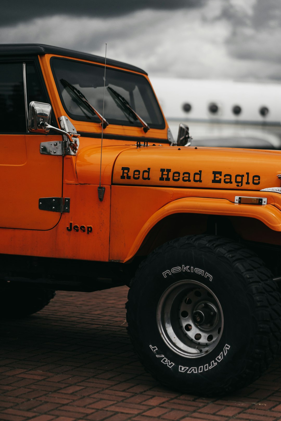orange and black jeep wrangler